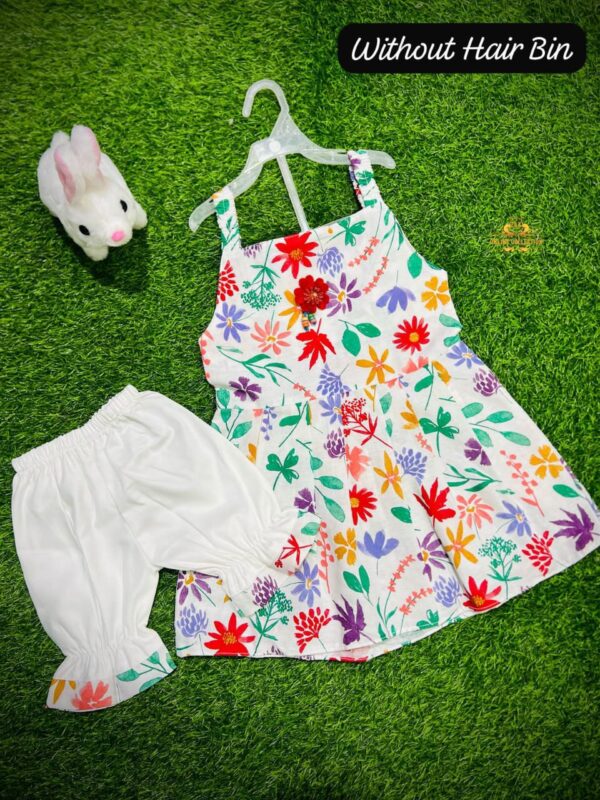 Adorable 3-Piece Baby Outfit Set – Frock, Shorts & Hair Bin for Just Rs. 1299 4
